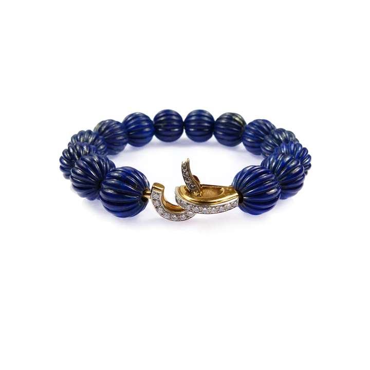 Fluted lapis lazuli bead and diamond bangle